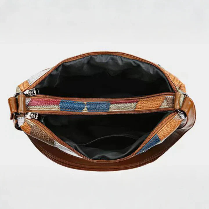 Bolso de mano de piel con mosaico